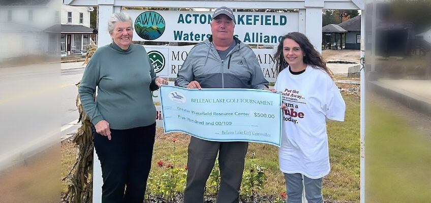 Belleau Lake Golf Tournament Raises Funds for GWRC! Frank Rago presents the donation.